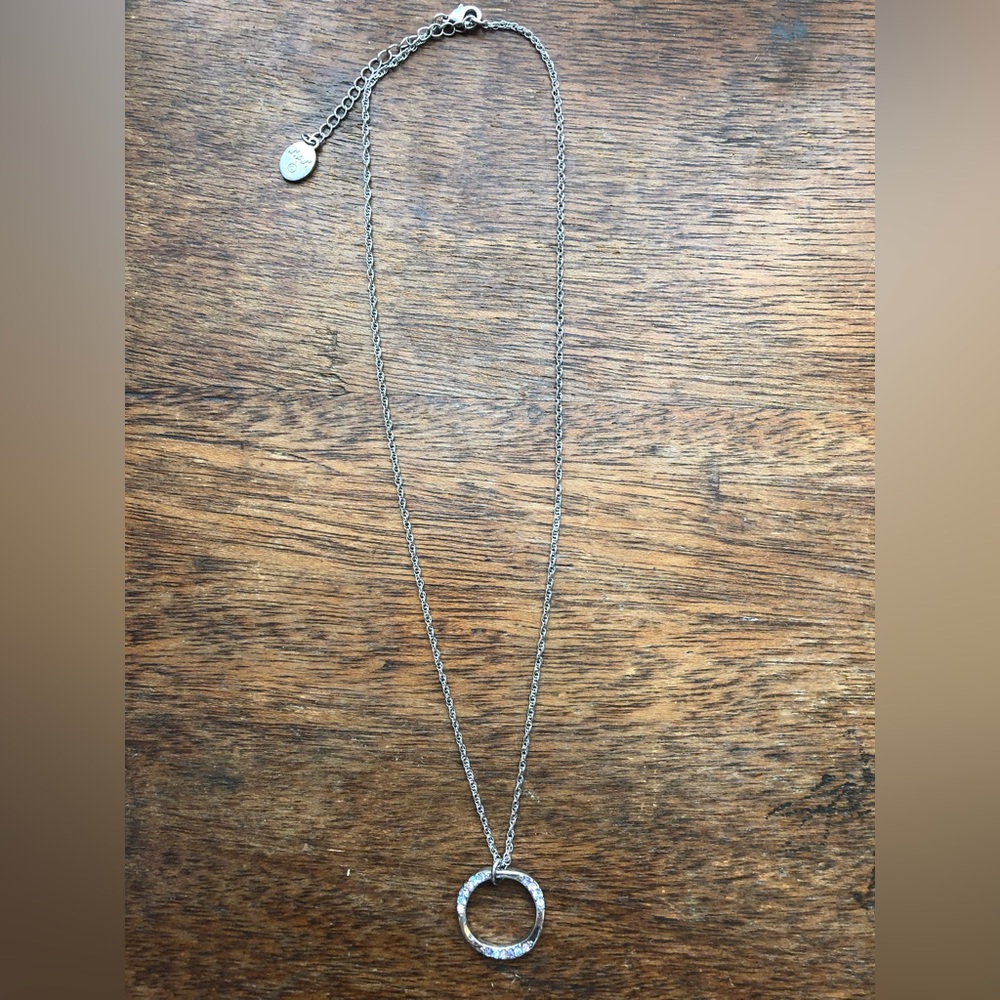 Silver necklace with 3 different colored gems